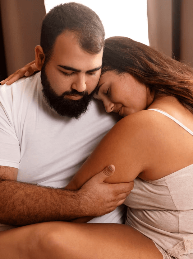 Romantic Indian BBW couple holding hands and smiling